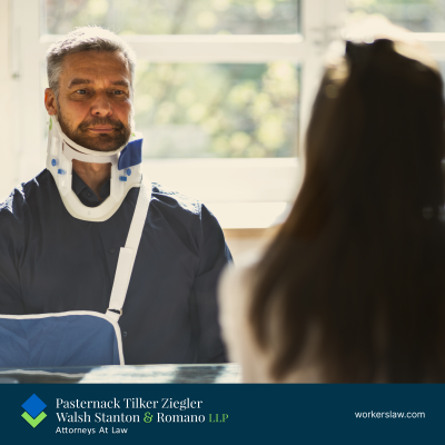 A Brooklyn man with a head and neck injury talking to a personal injury lawyer